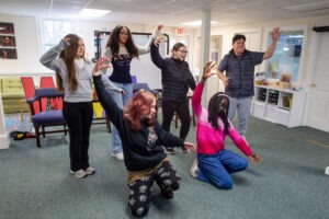 Photo of six teenagers participating in WAM Theatre's 2024 Teen Ensemble rehearsals